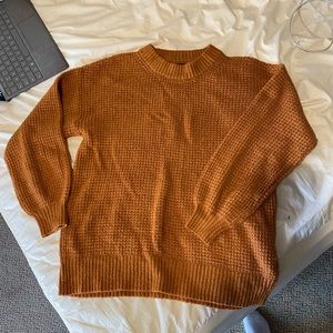 Long, knit sweater
